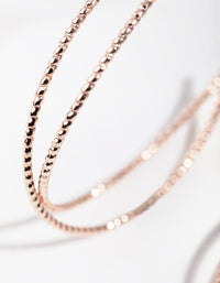 Rose Gold Crossover Hoop Earrings - link has visual effect only