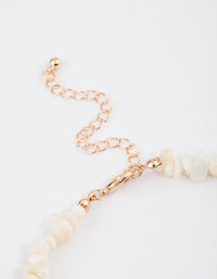 Gold Pearly Puka Necklace - link has visual effect only