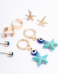 Gold & Blush Sandy Starfish Ear Stack - link has visual effect only