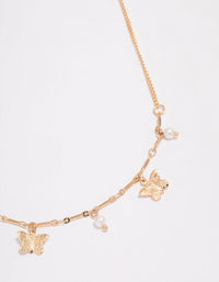 Gold Pearl Butterfly Droplet Necklace - link has visual effect only