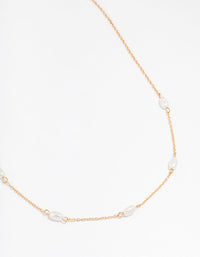 Gold Oval Pearl Station Necklace - link has visual effect only