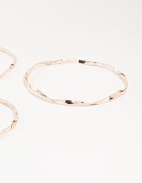 Rose Gold Twisted Bangles 5-Pack - link has visual effect only